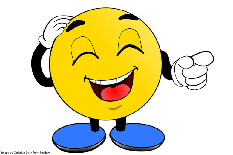 Smiley laughing and pointing at someone or something