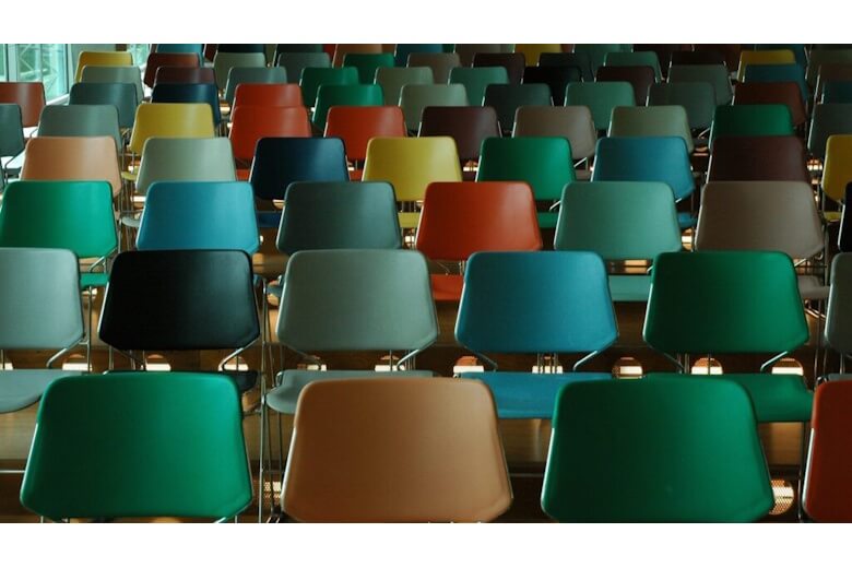 Rows of multi coloured chairs